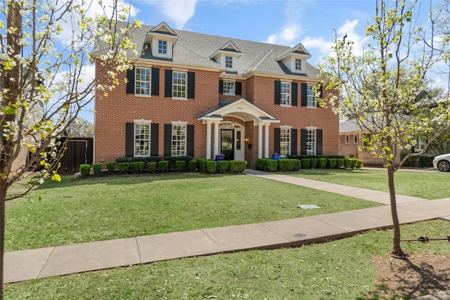 6946 Southridge Dr, Dallas, TX 75214 - colonial house featuring brick siding