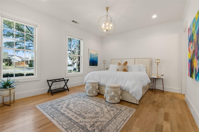 6946 Southridge Dr, Dallas, TX 75214 - bedroom with multiple windows, a chandelier, light wood-type flooring, baseboards, and ornamental molding
