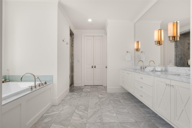6946 Southridge Dr, Dallas, TX 75214 - full bath featuring double vanity, a bath, marble finish floors, baseboards, and crown molding