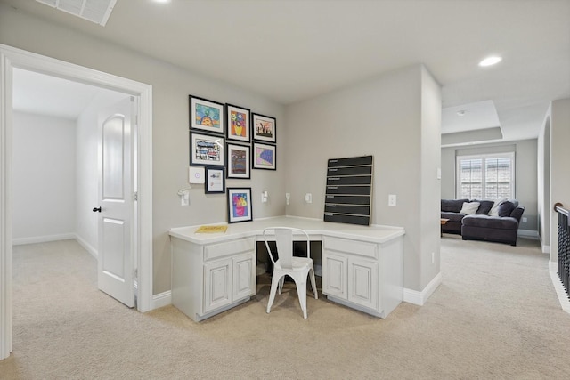 home office featuring built in desk, baseboards, light colored carpet, and recessed lighting