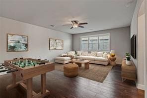 1596 Mannheim Dr, Rockwall, TX 75032 - living area featuring ceiling fan and dark wood-style floors
