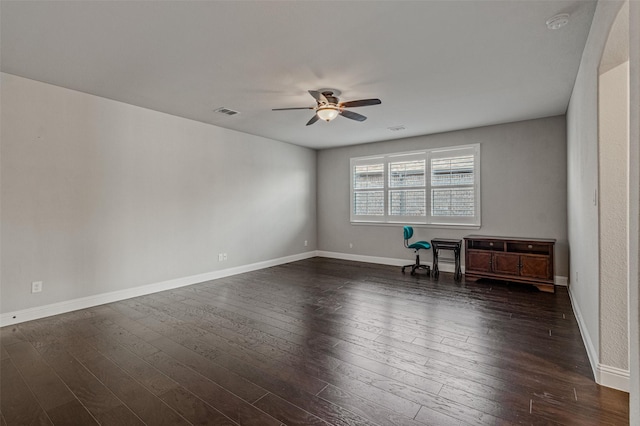 1596 Mannheim Dr, Rockwall, TX 75032 - spare room with baseboards, ceiling fan, dark wood finished floors, and visible vents