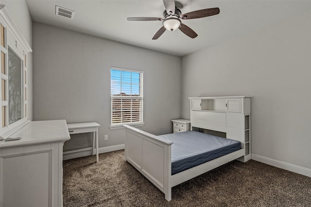 1596 Mannheim Dr, Rockwall, TX 75032 - bedroom with visible vents, baseboards, ceiling fan, and dark colored carpet