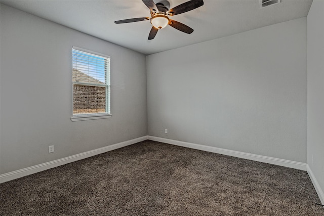 1596 Mannheim Dr, Rockwall, TX 75032 - spare room featuring baseboards, ceiling fan, dark colored carpet, and visible vents