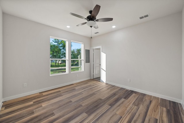unfurnished room featuring wood finished floors, ceiling fan, recessed lighting, and baseboards