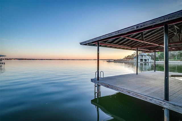 dock area featuring a water view
