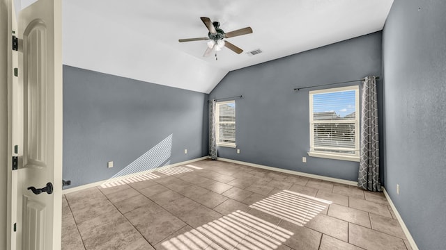 4315 Logan Cir, Granbury, TX 76049 - tiled spare room with a ceiling fan, vaulted ceiling, and baseboards