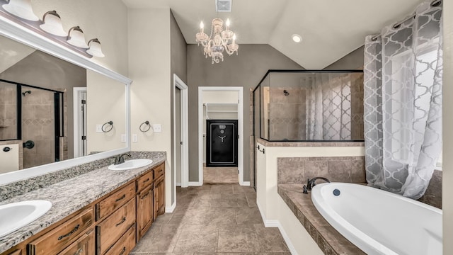 4315 Logan Cir, Granbury, TX 76049 - bathroom with a bath, a shower stall, double vanity, vaulted ceiling, and a chandelier