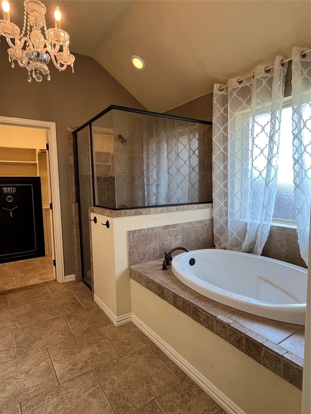 4315 Logan Cir, Granbury, TX 76049 - bathroom featuring a bath, a stall shower, lofted ceiling, baseboards, and a chandelier