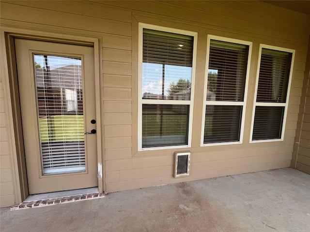 4315 Logan Cir, Granbury, TX 76049 - property entrance with a patio area