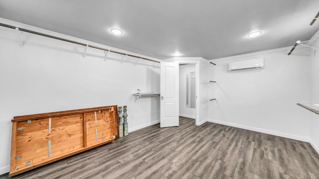 4315 Logan Cir, Granbury, TX 76049 - finished basement with a wall unit AC, wood finished floors, baseboards, and recessed lighting