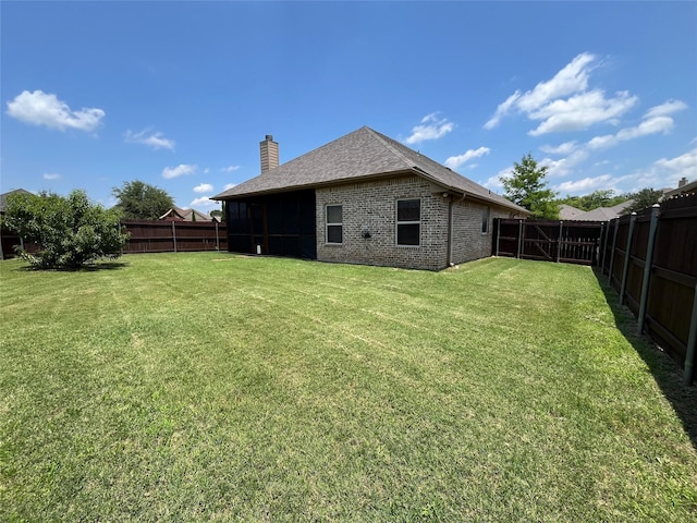 4315 Logan Cir, Granbury, TX 76049 - rear view of house with a chimney, brick siding, and roof with shingles