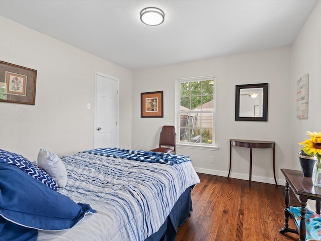 5134 Anderson Cir, Garland, TX 75043 - bedroom with wood finished floors and baseboards