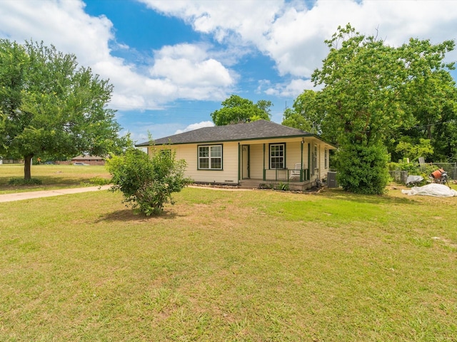 5134 Anderson Cir, Garland, TX 75043 - view of front of property with a porch, a front lawn, and cooling unit
