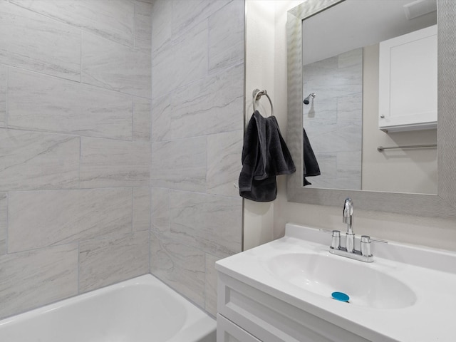 5134 Anderson Cir, Garland, TX 75043 - bathroom featuring vanity and bathing tub / shower combination