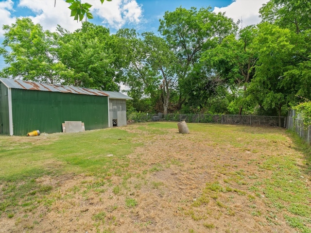 5134 Anderson Cir, Garland, TX 75043 - view of yard with an outbuilding, an outdoor structure, and view of scattered trees