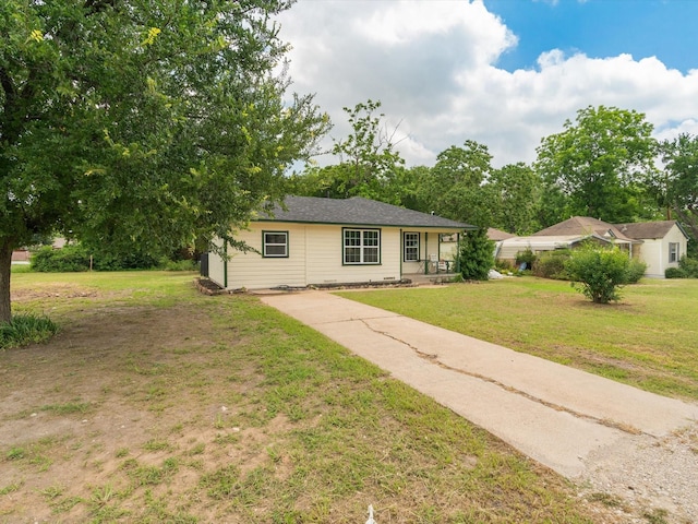 5134 Anderson Cir, Garland, TX 75043 - ranch-style home featuring a front lawn and driveway