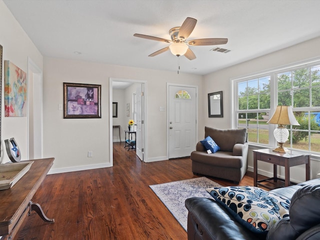 5134 Anderson Cir, Garland, TX 75043 - living area featuring wood finished floors, a ceiling fan, and baseboards