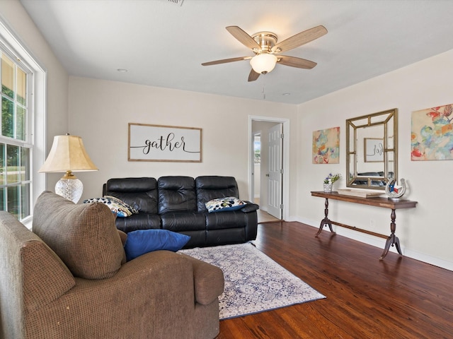 5134 Anderson Cir, Garland, TX 75043 - living room with wood finished floors, ceiling fan, and baseboards
