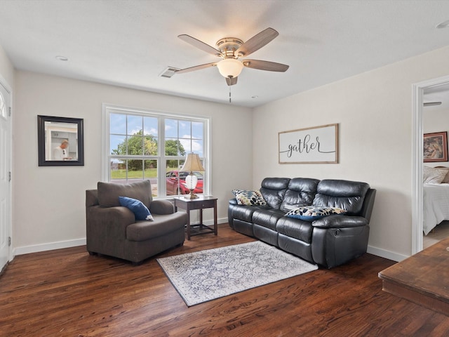5134 Anderson Cir, Garland, TX 75043 - living room with a ceiling fan, wood finished floors, and baseboards