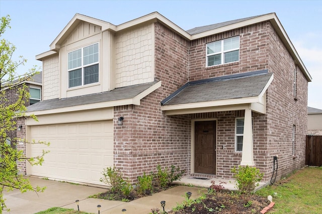 traditional-style home featuring fence, concrete driveway, an attached garage, and brick siding