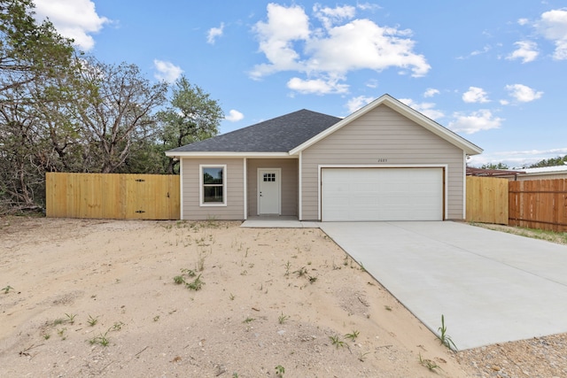 2685 Thompson Rd, Weatherford, TX 76087 - ranch-style home with an attached garage, concrete driveway, and roof with shingles