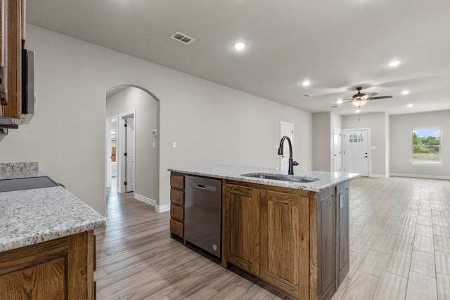 2685 Thompson Rd, Weatherford, TX 76087 - kitchen with dishwasher, a sink, arched walkways, ceiling fan, and recessed lighting