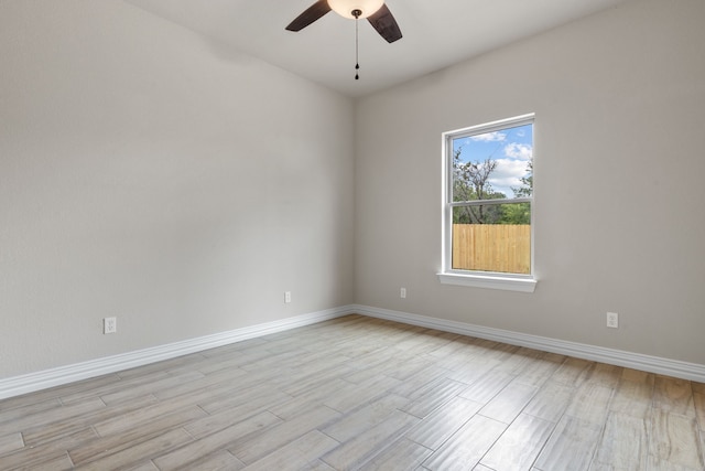 2685 Thompson Rd, Weatherford, TX 76087 - empty room featuring ceiling fan, light wood-style floors, and baseboards