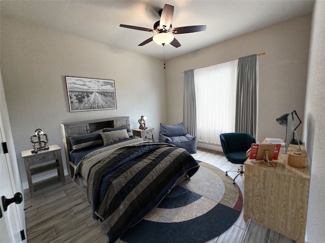 2685 Thompson Rd, Weatherford, TX 76087 - bedroom featuring wood finished floors and ceiling fan