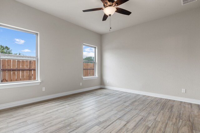 2685 Thompson Rd, Weatherford, TX 76087 - spare room with ceiling fan, wood finished floors, and baseboards