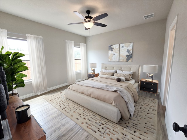 2685 Thompson Rd, Weatherford, TX 76087 - bedroom featuring wood finished floors, baseboards, and ceiling fan