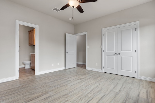 2685 Thompson Rd, Weatherford, TX 76087 - unfurnished bedroom featuring light wood-type flooring, a closet, baseboards, and connected bathroom