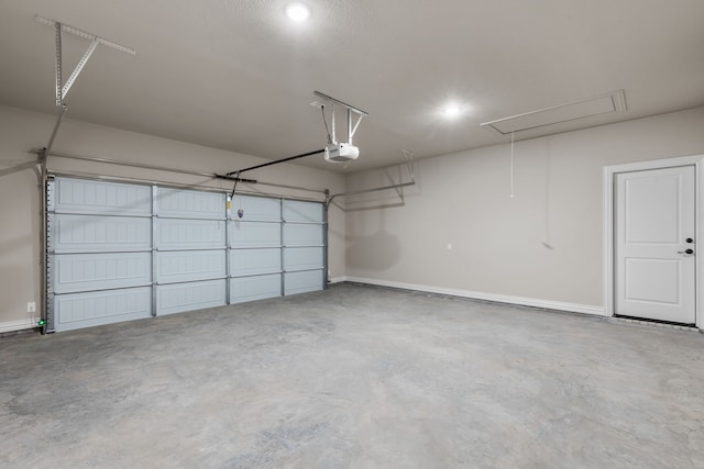2685 Thompson Rd, Weatherford, TX 76087 - garage featuring a garage door opener, baseboards, and recessed lighting
