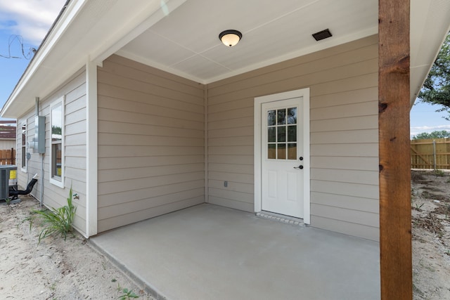 2685 Thompson Rd, Weatherford, TX 76087 - property entrance featuring a patio and central AC unit