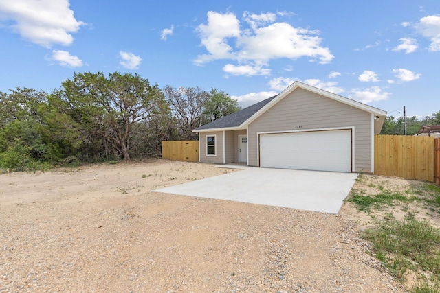2685 Thompson Rd, Weatherford, TX 76087 - single story home with driveway and a garage