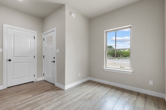 2685 Thompson Rd, Weatherford, TX 76087 - entrance foyer featuring light wood finished floors and baseboards