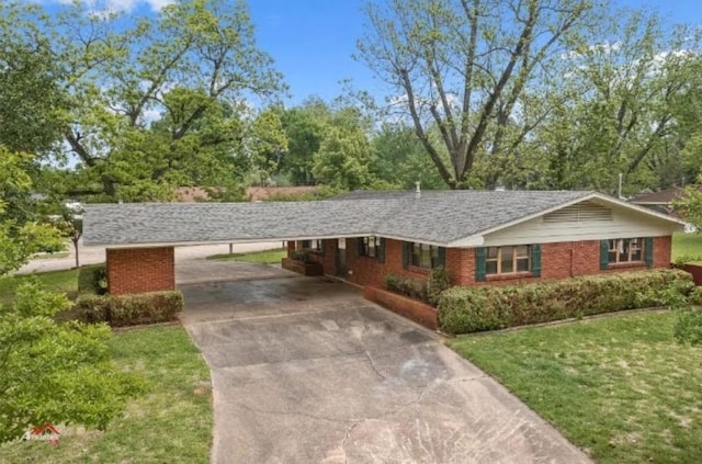 1618 Success St, Bossier City, LA 71112 - single story home with brick siding, a carport, a front yard, and concrete driveway