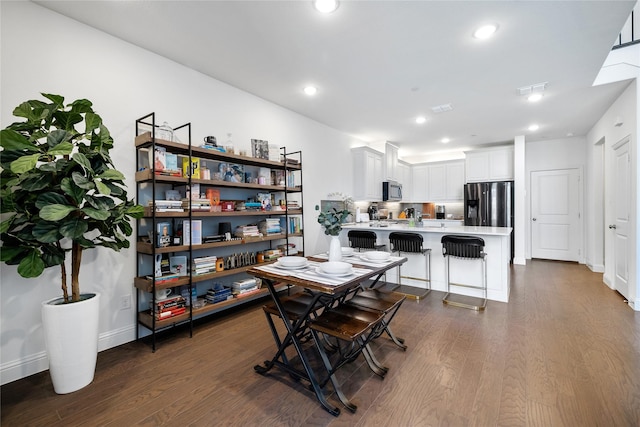 7223 Sideoats Gama St, Frisco, TX 75033 - dining space with dark wood-style floors, recessed lighting, and baseboards