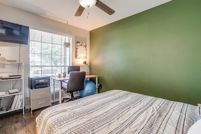 136 NW Suzanne Ter, Burleson, TX 76028 - bedroom featuring dark wood-style flooring, an office area, and a ceiling fan