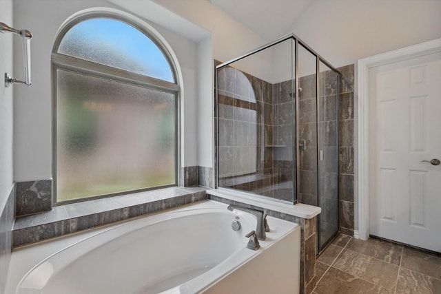 1125 Overton St, Frisco, TX 75036 - bathroom with a tile shower and a garden tub