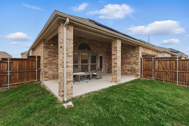 1125 Overton St, Frisco, TX 75036 - back of property with brick siding and a patio