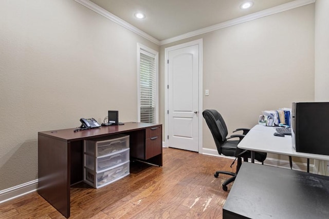 home office featuring recessed lighting, wood finished floors, baseboards, and ornamental molding