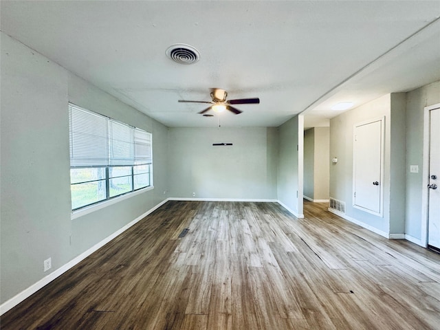 interior space featuring wood finished floors and visible vents