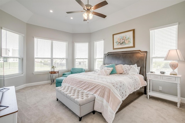 bedroom with baseboards, recessed lighting, ceiling fan, and light colored carpet
