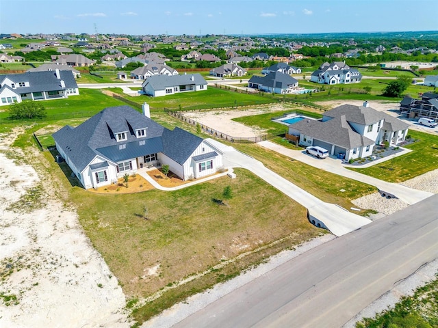 drone / aerial view featuring a residential view