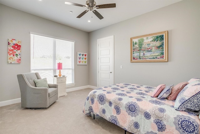 bedroom with baseboards, recessed lighting, light carpet, and a ceiling fan