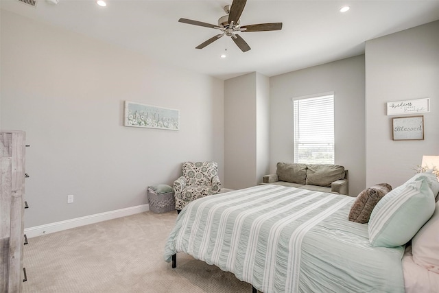bedroom with light carpet, recessed lighting, baseboards, and a ceiling fan