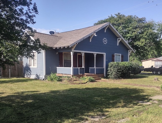 301 E White St, Pilot Point, TX 76258 - view of front of home with a porch and a shingled roof
