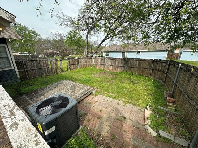 301 E White St, Pilot Point, TX 76258 - view of yard featuring cooling unit, a wooden deck, and a patio