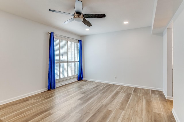 6050 Birchbrook Dr Unit 142, Dallas, TX 75206 - spare room with a ceiling fan, light wood-style floors, baseboards, and recessed lighting